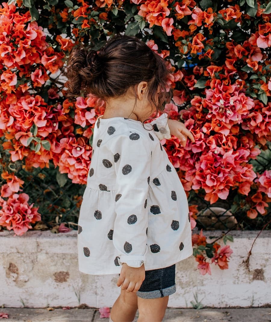Child in a polka-dot top